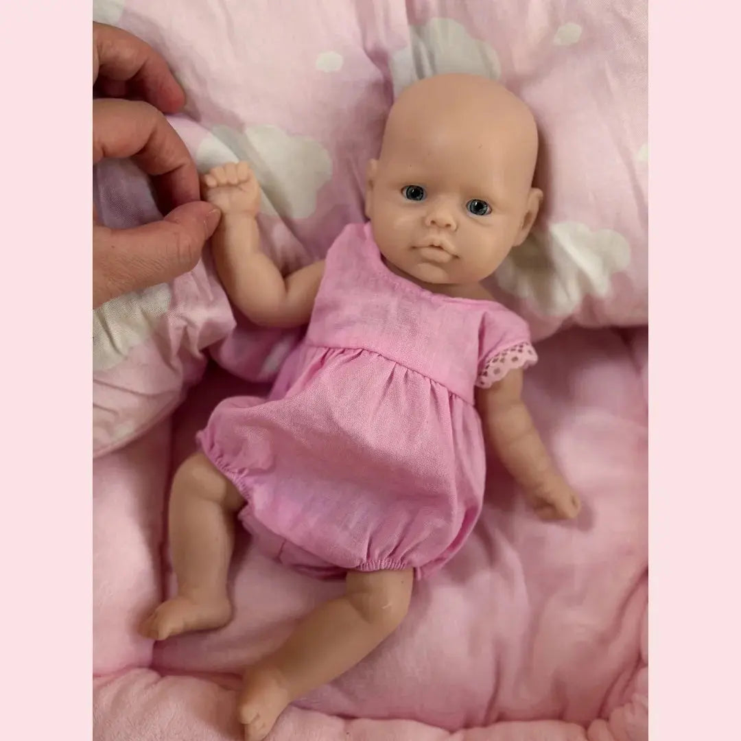 10Inch /2 Styles Washable Unpainted Open Eyes Solid Silicone Girls Doll Soft Touch Feeling Lifelike Realistic Bebe Reborn lifelikesiliconereborns.com