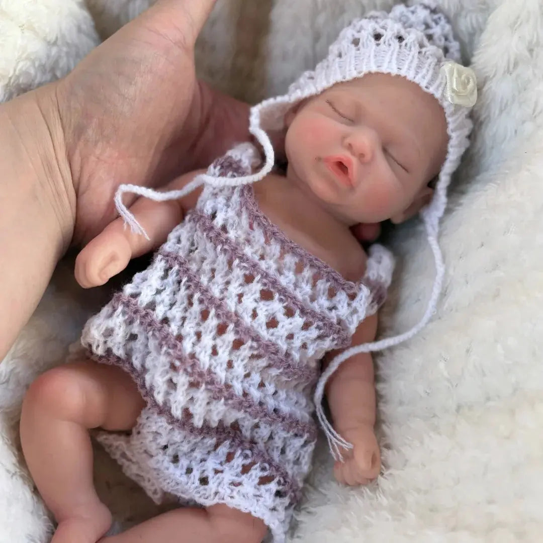 10Inch Sleeping Silicone bébé reborn Girl Doll With Painted Skin Full Body Silicone Lifelike Reborn Dolls lifelikesiliconereborns.com