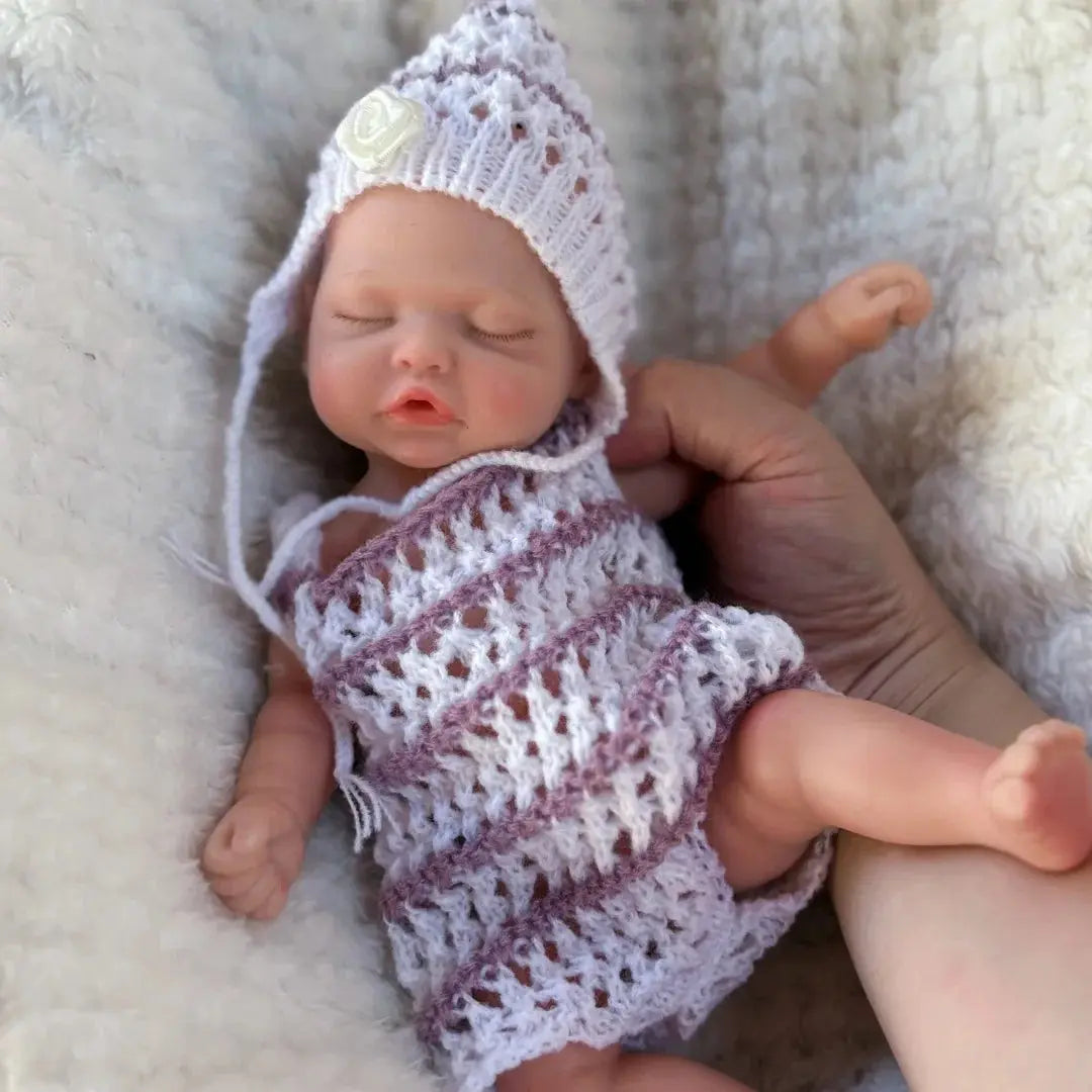 10Inch Sleeping Silicone bébé reborn Girl Doll With Painted Skin Full Body Silicone Lifelike Reborn Dolls lifelikesiliconereborns.com