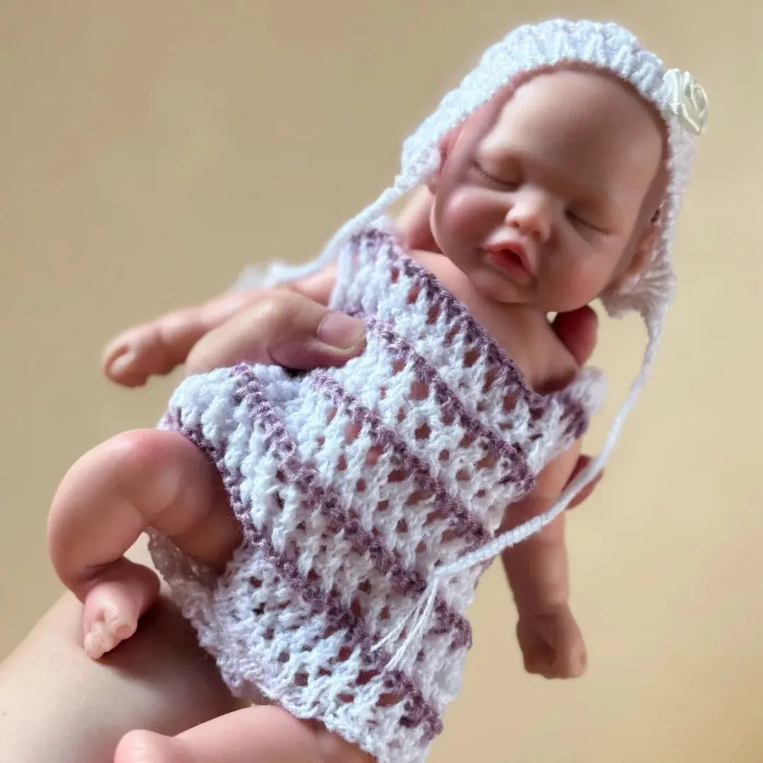 10Inch Sleeping Silicone bébé reborn Girl Doll With Painted Skin Full Body Silicone Lifelike Reborn Dolls lifelikesiliconereborns.com