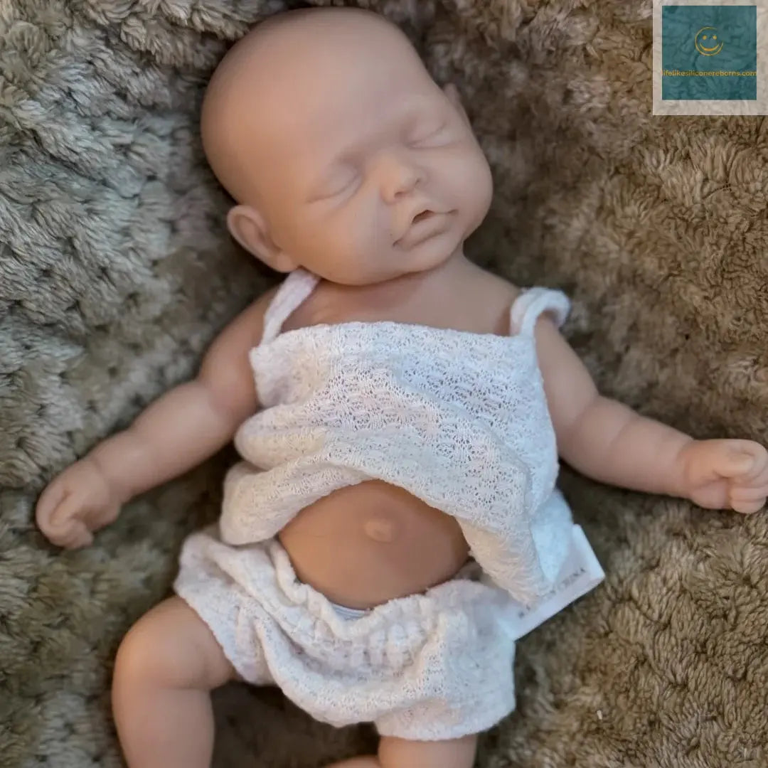 10Inch Sleeping Silicone bébé reborn Girl Doll With Painted Skin Full Body Silicone Lifelike Reborn Dolls lifelikesiliconereborns.com