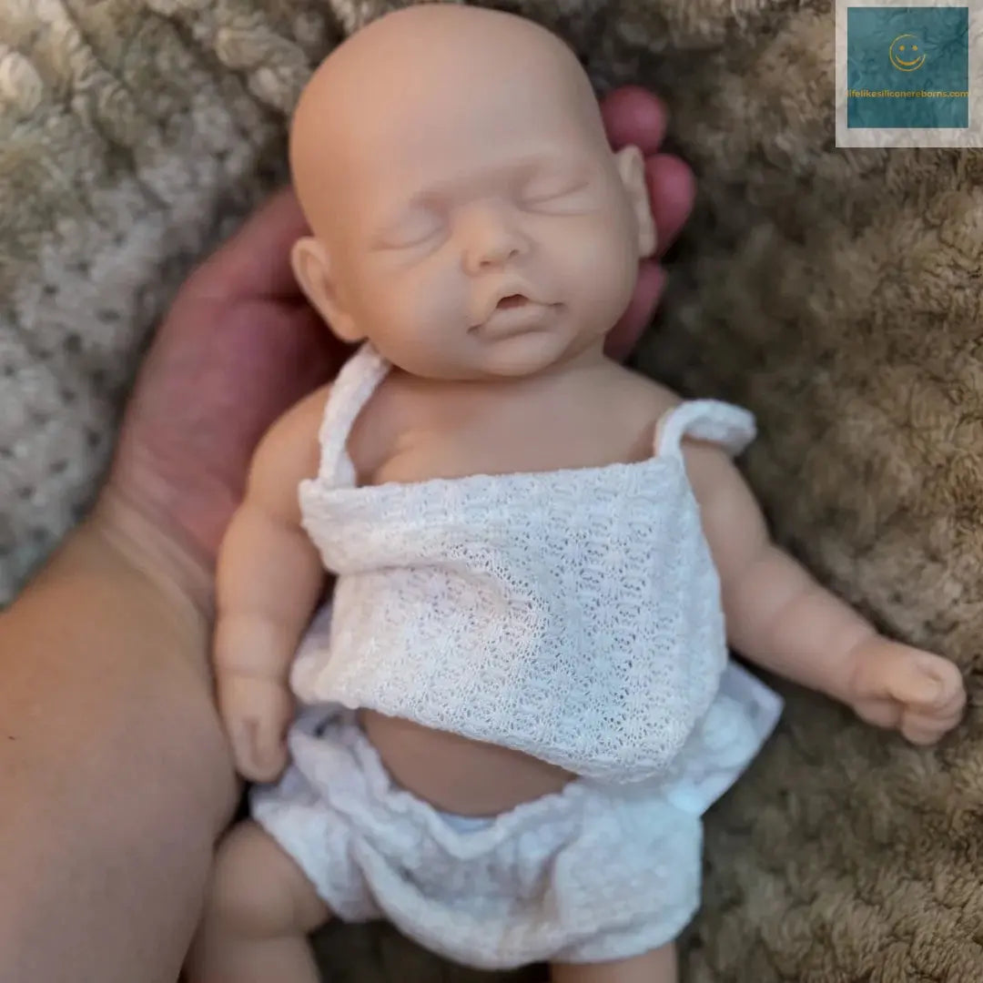 10Inch Sleeping Silicone bébé reborn Girl Doll With Painted Skin Full Body Silicone Lifelike Reborn Dolls lifelikesiliconereborns.com