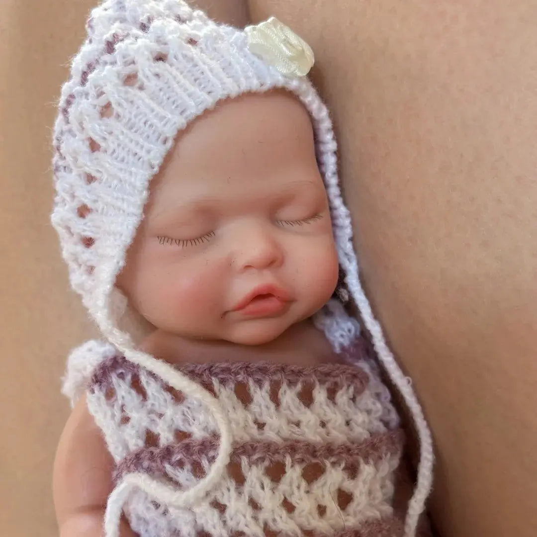 10Inch Sleeping Silicone bébé reborn Girl Doll With Painted Skin Full Body Silicone Lifelike Reborn Dolls lifelikesiliconereborns.com