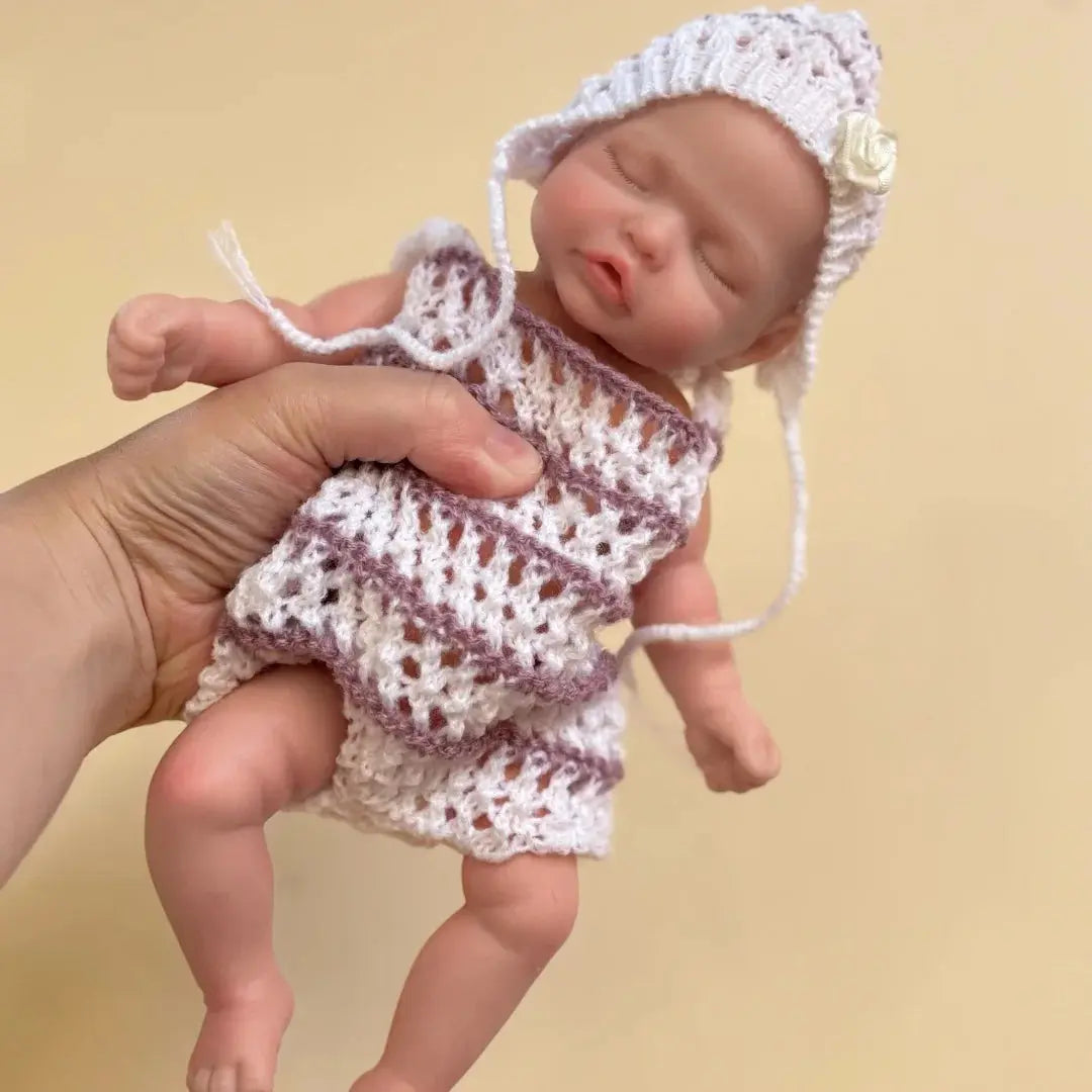 10Inch Sleeping Silicone bébé reborn Girl Doll With Painted Skin Full Body Silicone Lifelike Reborn Dolls lifelikesiliconereborns.com