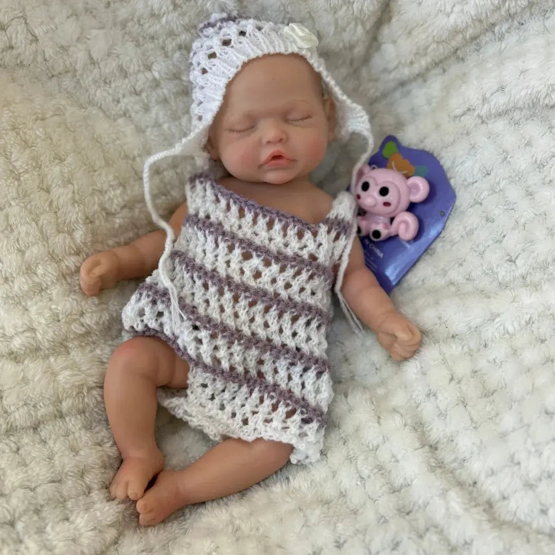 10Inch Sleeping Silicone bébé reborn Girl Doll With Painted Skin Full Body Silicone Lifelike Reborn Dolls lifelikesiliconereborns.com