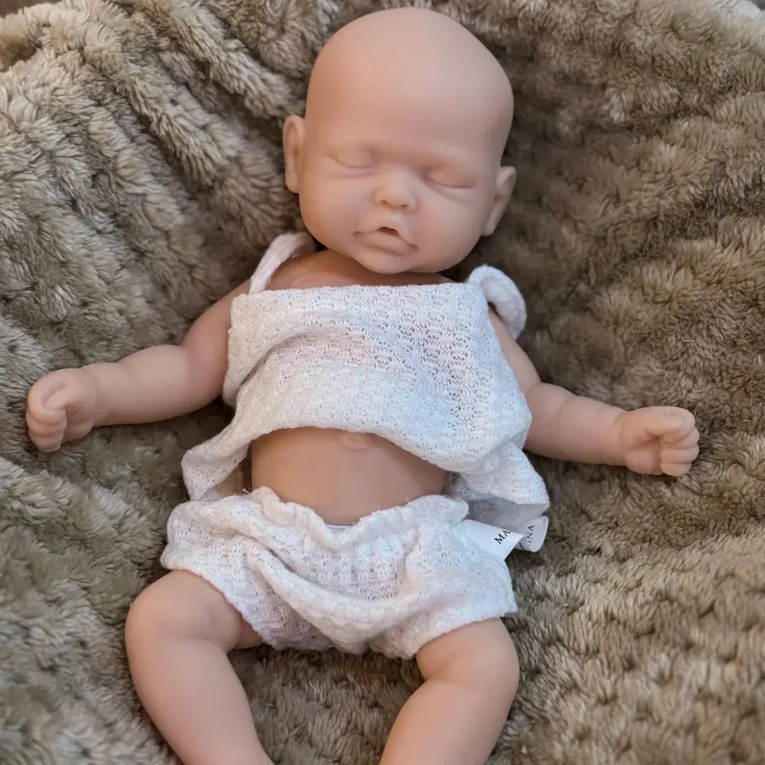10Inch Sleeping Silicone bébé reborn Girl Doll With Painted Skin Full Body Silicone Lifelike Reborn Dolls lifelikesiliconereborns.com