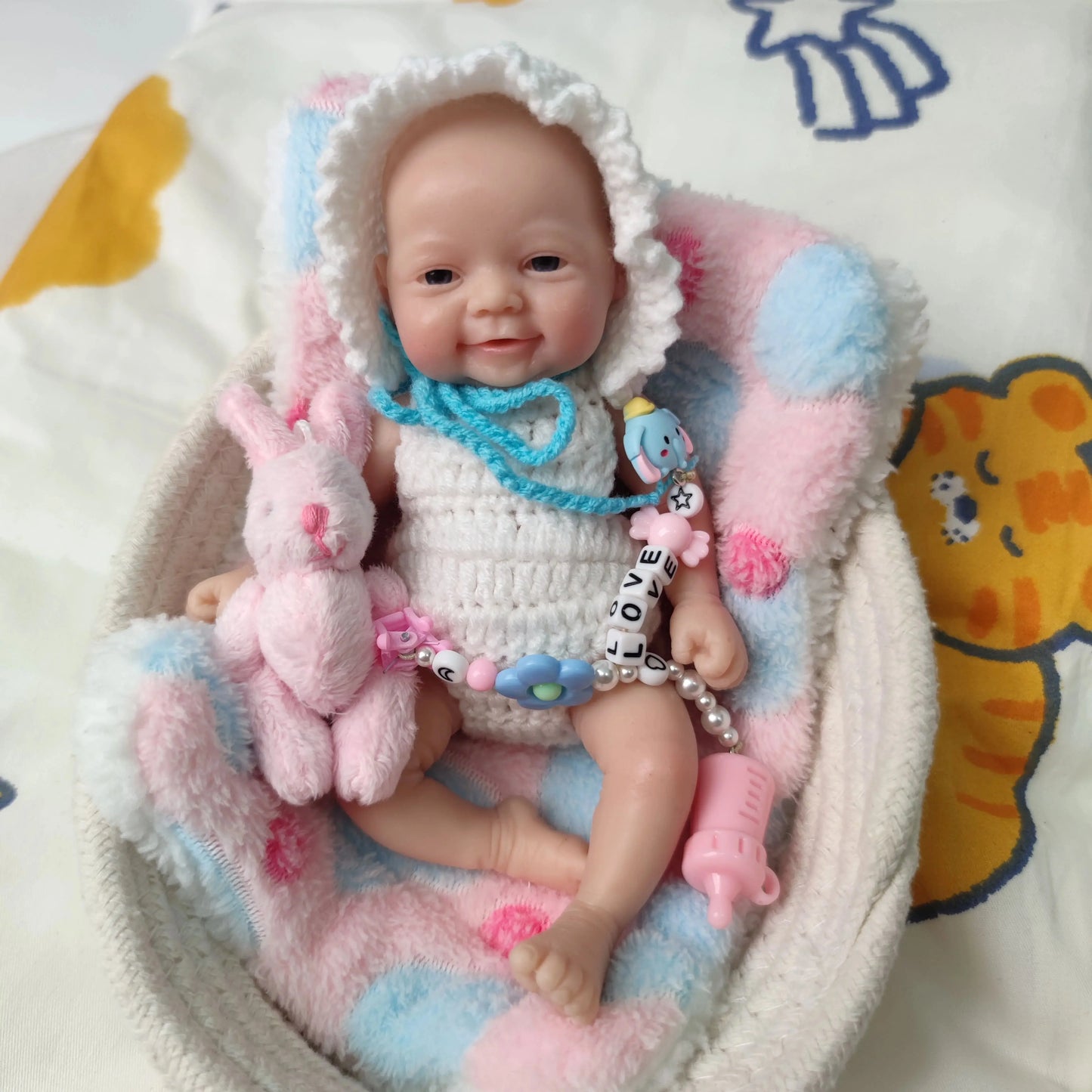 7 inch Full Body Silicone Mini Reborn Baby Doll That Looks Real with White Clothes and Toy Accessories for kids Christmas Gift lifelikesiliconereborns.com