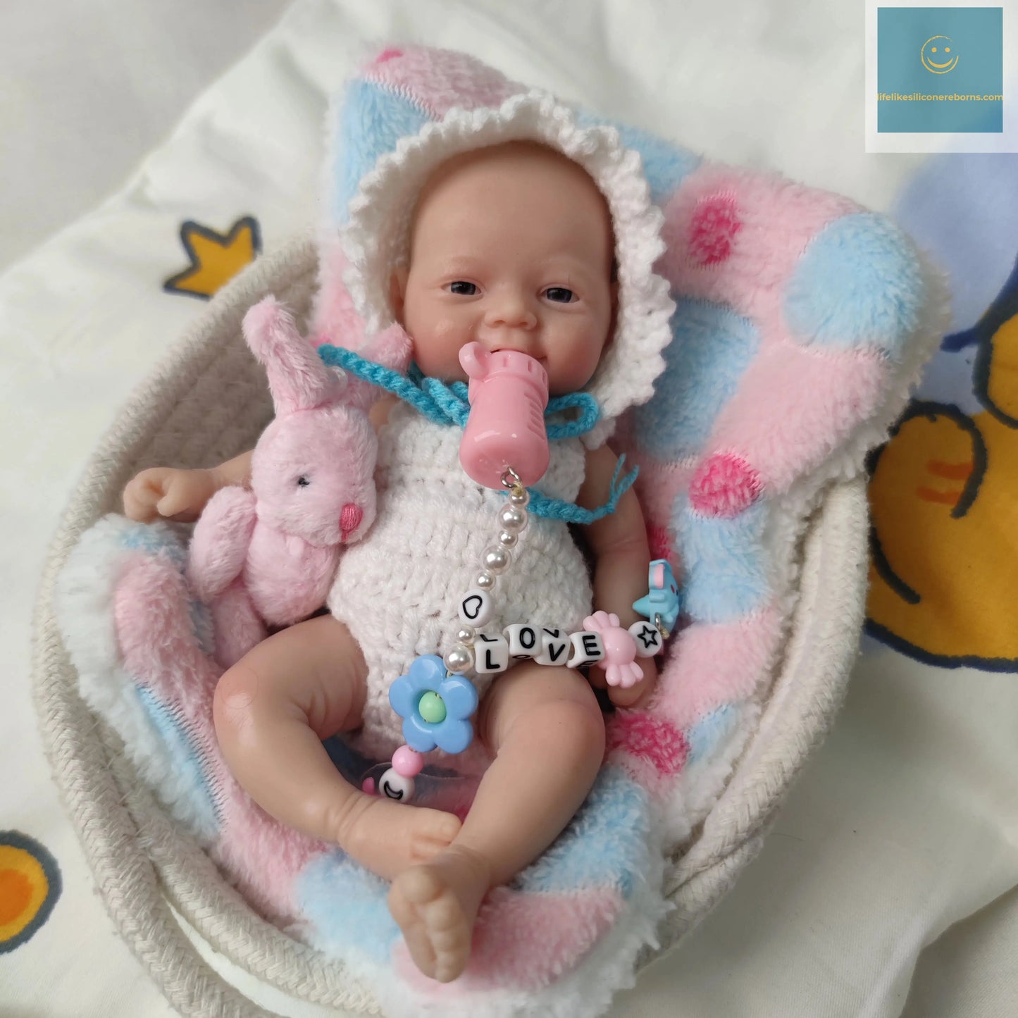 7 inch Full Body Silicone Mini Reborn Baby Doll That Looks Real with White Clothes and Toy Accessories for kids Christmas Gift lifelikesiliconereborns.com