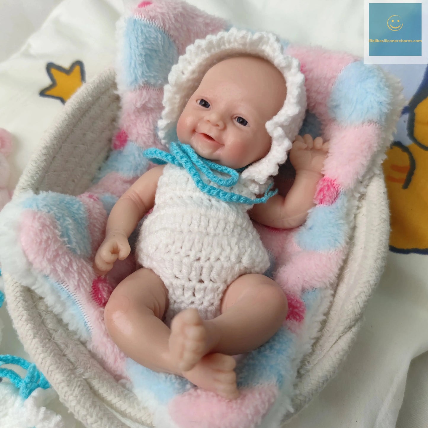 7 inch Full Body Silicone Mini Reborn Baby Doll That Looks Real with White Clothes and Toy Accessories for kids Christmas Gift lifelikesiliconereborns.com
