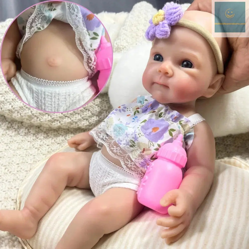 girl silicone reborn baby doll wear pink clothes 