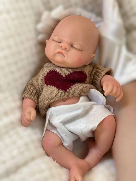 10Inch Silicone Boy Reborn Baby Doll Full Body Soft Solid Silicone Painted Lifelike Newborn Dolls reborn de silicone real cuerpo lifelikesiliconereborns.com
