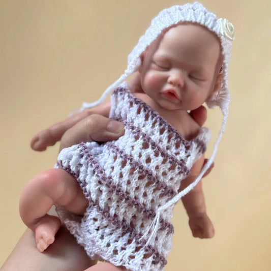 10Inch Sleeping Silicone bébé reborn Girl Doll With Painted Skin Full Body Silicone Lifelike Reborn Dolls lifelikesiliconereborns.com