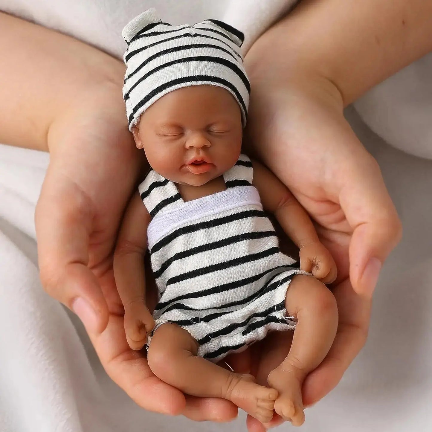 Full Body Silicone Baby Reborn Doll 7 Inch Lifelike Sleeping Black Skin Girl with Toy Accessories for Kids Christmas Gift lifelikesiliconereborns.com