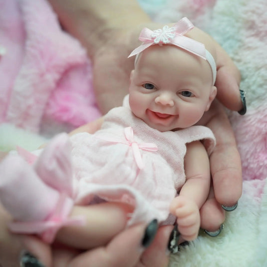 Miniature Babies 7 Inch Silicone Full Body reborn Baby Doll Smile Baby Girl Dolls That Looks Real with Pink Dress for Ages 3 + lifelikesiliconereborns.com