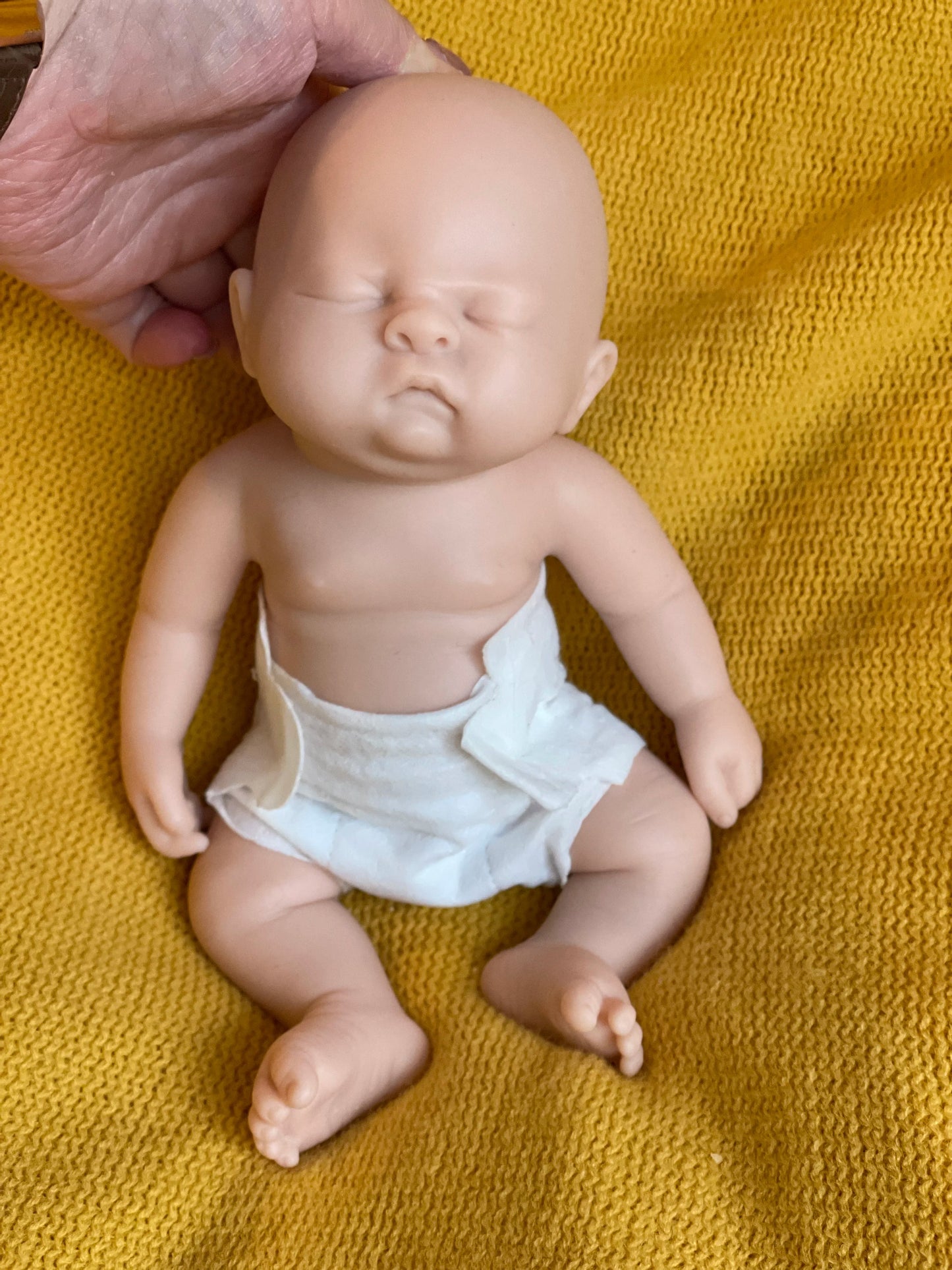 10Inch Silicone Boy Reborn Baby Doll Full Body Soft Solid Silicone Painted Lifelike Newborn Dolls reborn de silicone real cuerpo lifelikesiliconereborns.com